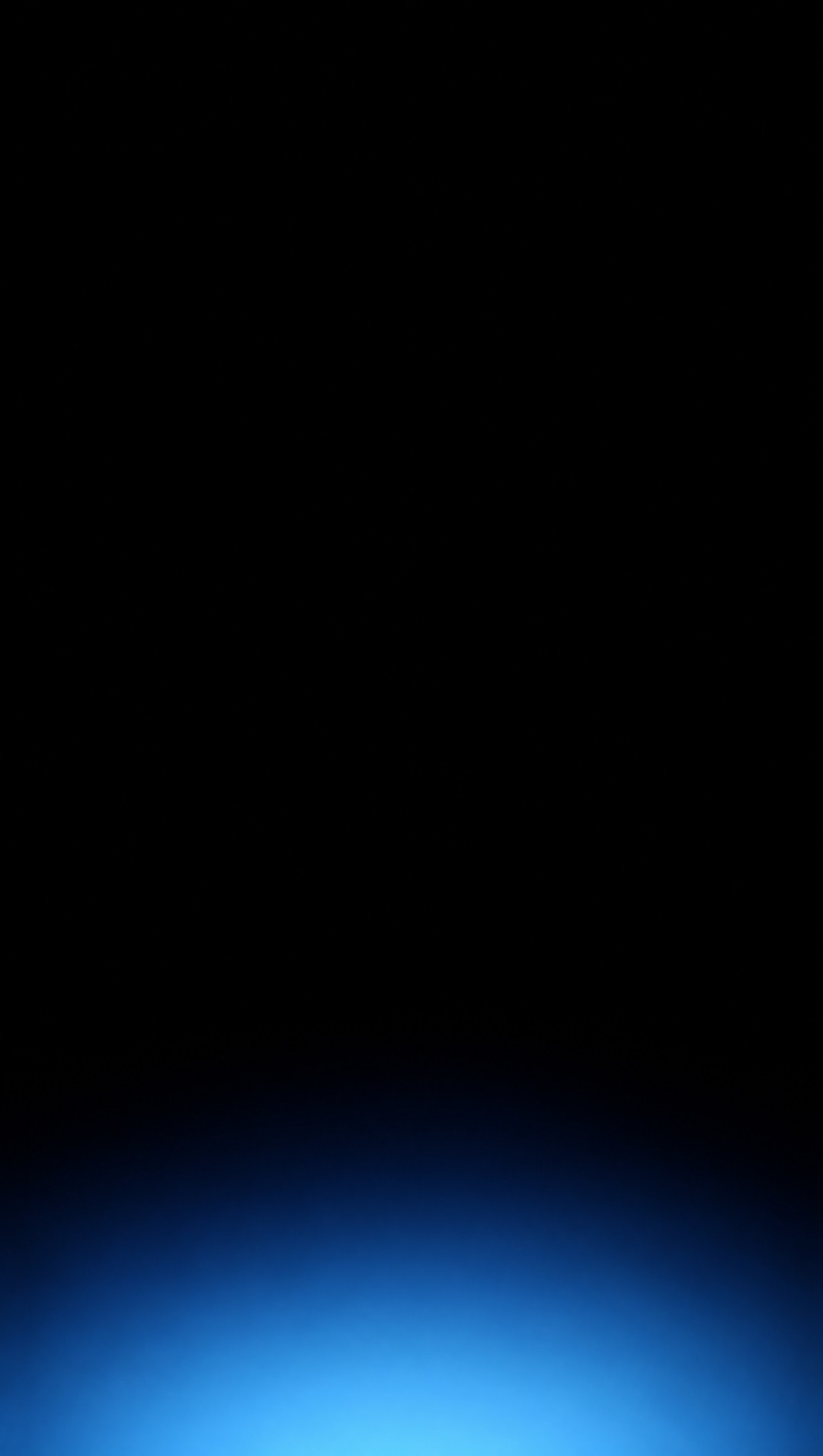 Near-total darkness. A tall black panel; at the very bottom, a faint cold cyan haze, like light seen from far above through mist. Nothing else is drawn.